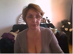 Attractive mom showing wild body and large melons