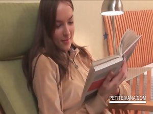 Teenager nymph Ivana masturbating her vulva on a chair