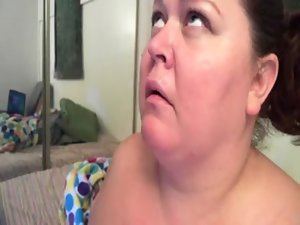 Obese Aubra licking and receiving jizz in mouth