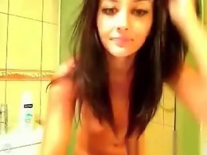 Amateur webcam dark haired hussy getting nude in the bathroom