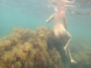 nude female underwater