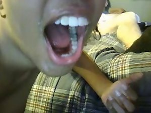 Ebony babe rides & licks white cock, accepts load in face