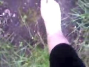 Obscene feet in the garden