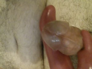 Masturbating with my wifes pinky vibrating sex toy shaft and cum