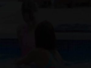 Dewy girl4girl kissing by the pool