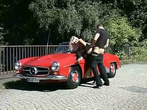 Fuck by a red Mercedes Benz