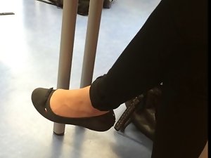 Student Ballerina shoes barefeet dangling