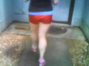 Roommate in red silk shorts with visible panty lines