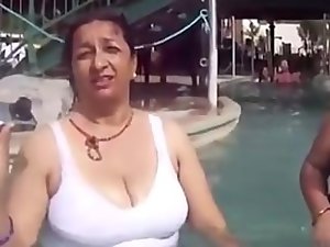 Randy indian - Nepali aunty with enormous melons bathing in pool and talking