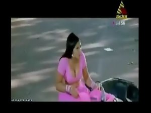 Desi actress exposing massive cleavage in sari