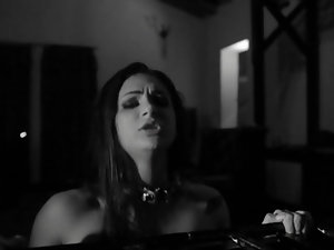 A busty chick is fucked in the black and white video today